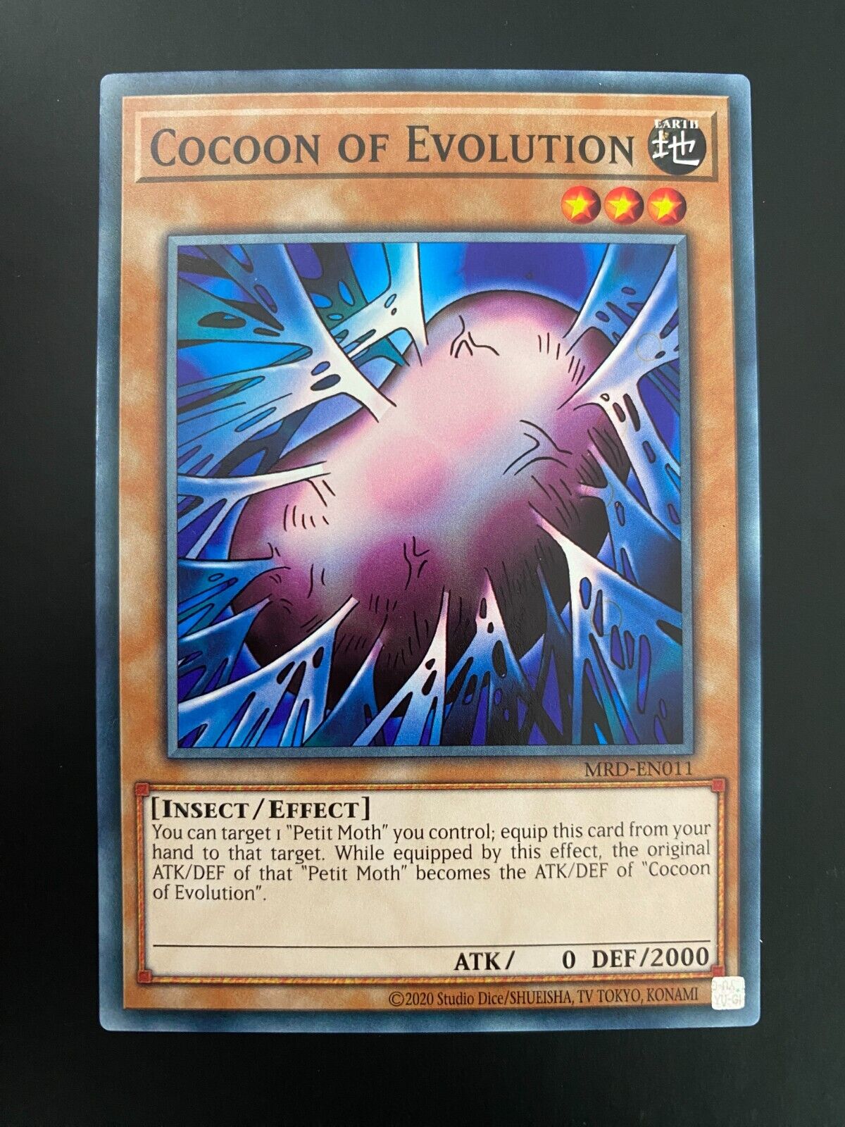 Yugioh Cocoon of Evolution MRD-EN011 Common Unlimited Edition NM/MINT