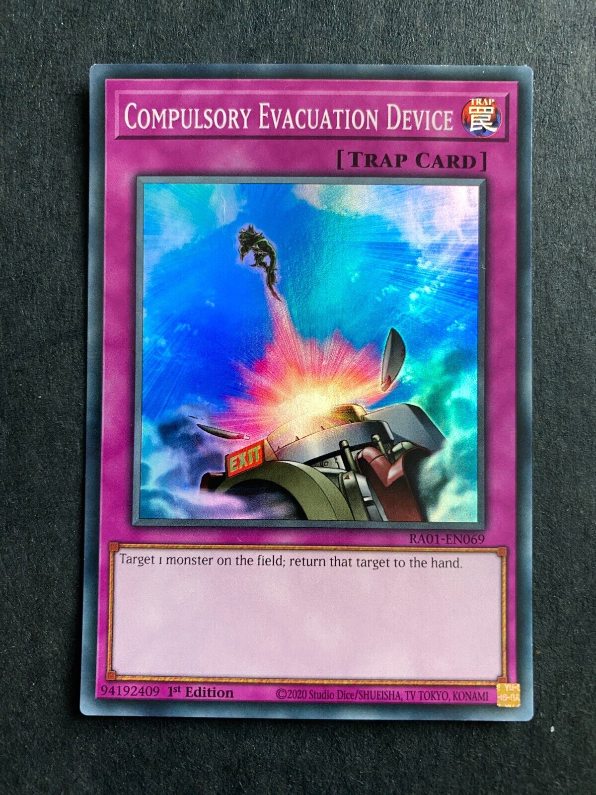 Yugioh Compulsory Evacuation Device RA01-EN069 Super Rare 1st Edition NM