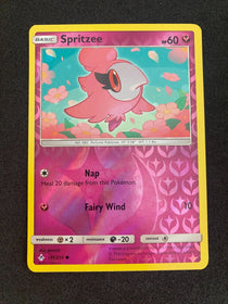 Pokemon Spritzee 141/214 Unbroken Bonds Reverse Holo NM