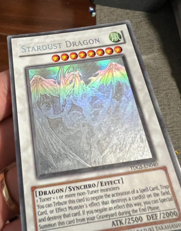 Yugioh Stardust Dragon TDGS-EN040 Ghost Rare Unlimited Edition DAMAGED - See pic