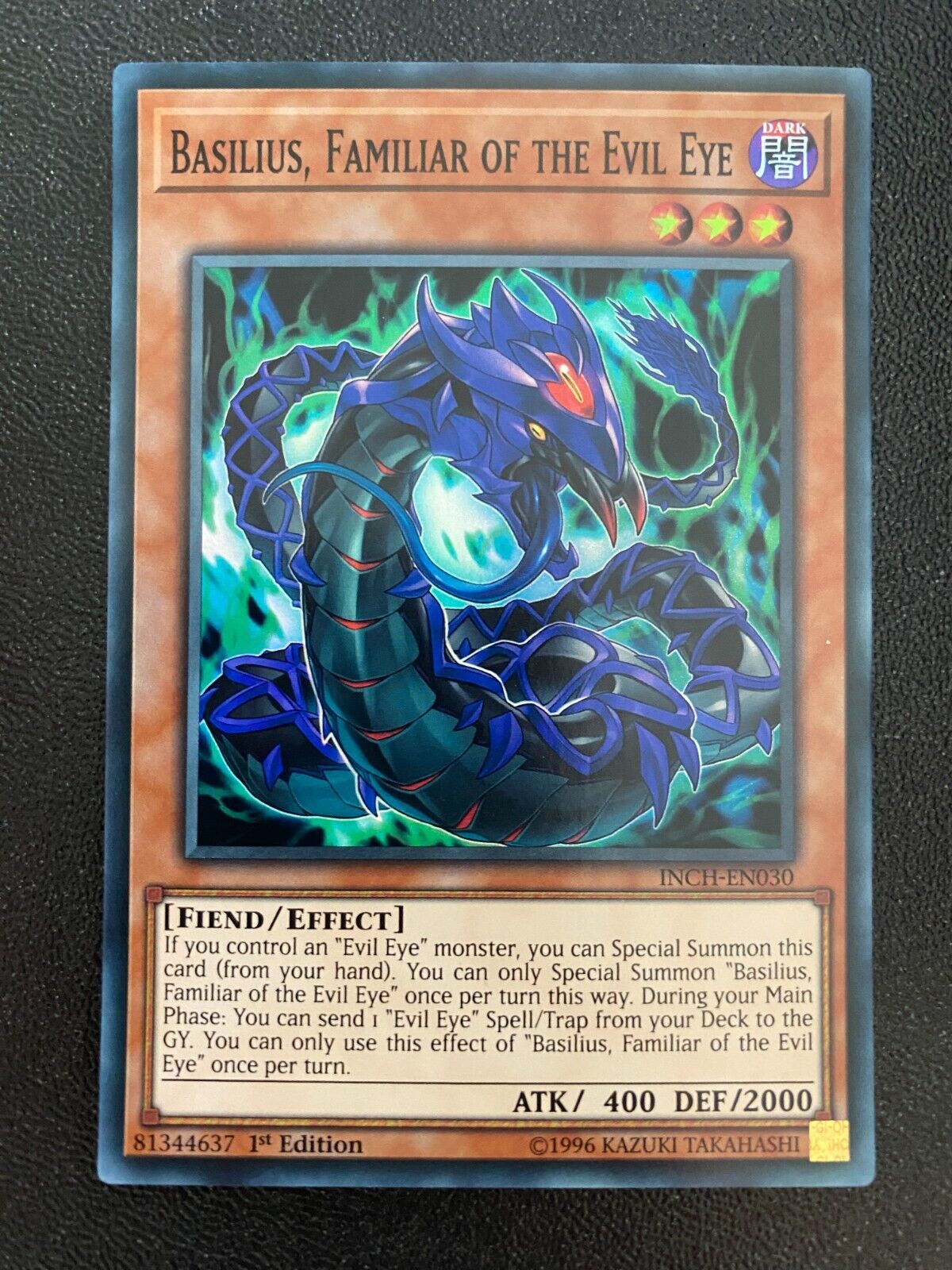 Yugioh Basilius, Familiar of the Evil Eye INCH-EN030 Super Rare 1st Edition NM