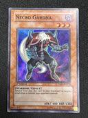 Yugioh Necro Gardna TAEV-EN012 1st Edition Super Rare MP (scratches)