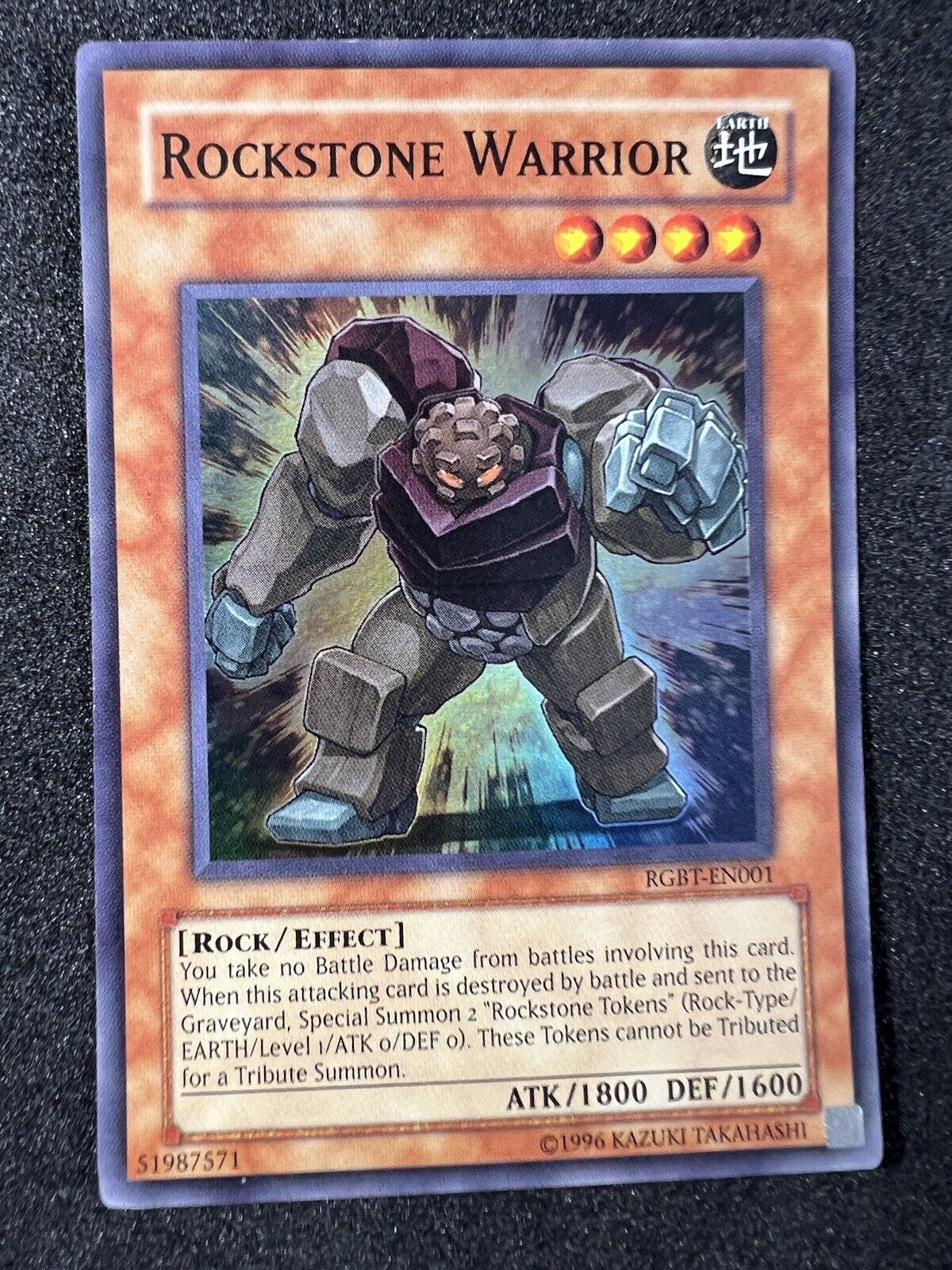 Yugioh Rockstone Warrior RGBT-EN001 Unlimited Super Rare NM