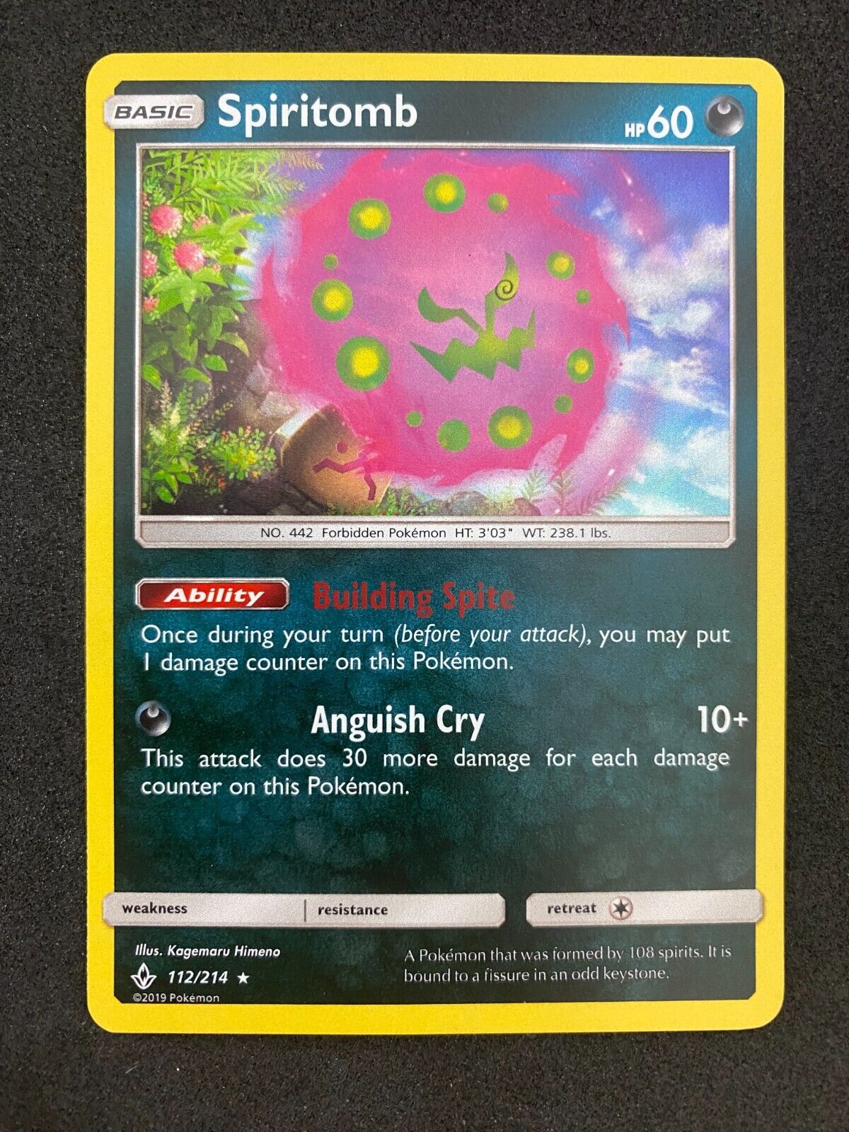 Pokemon Spiritomb 112/214 Unbroken Bonds Holo NM