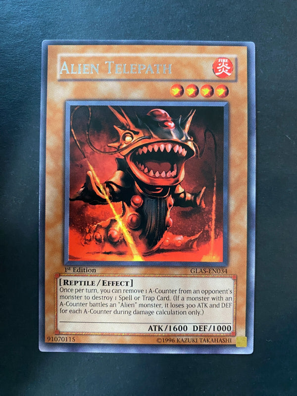 Yugioh Alien Telepath GLAS-EN034 Rare 1st Edition VLP/NM