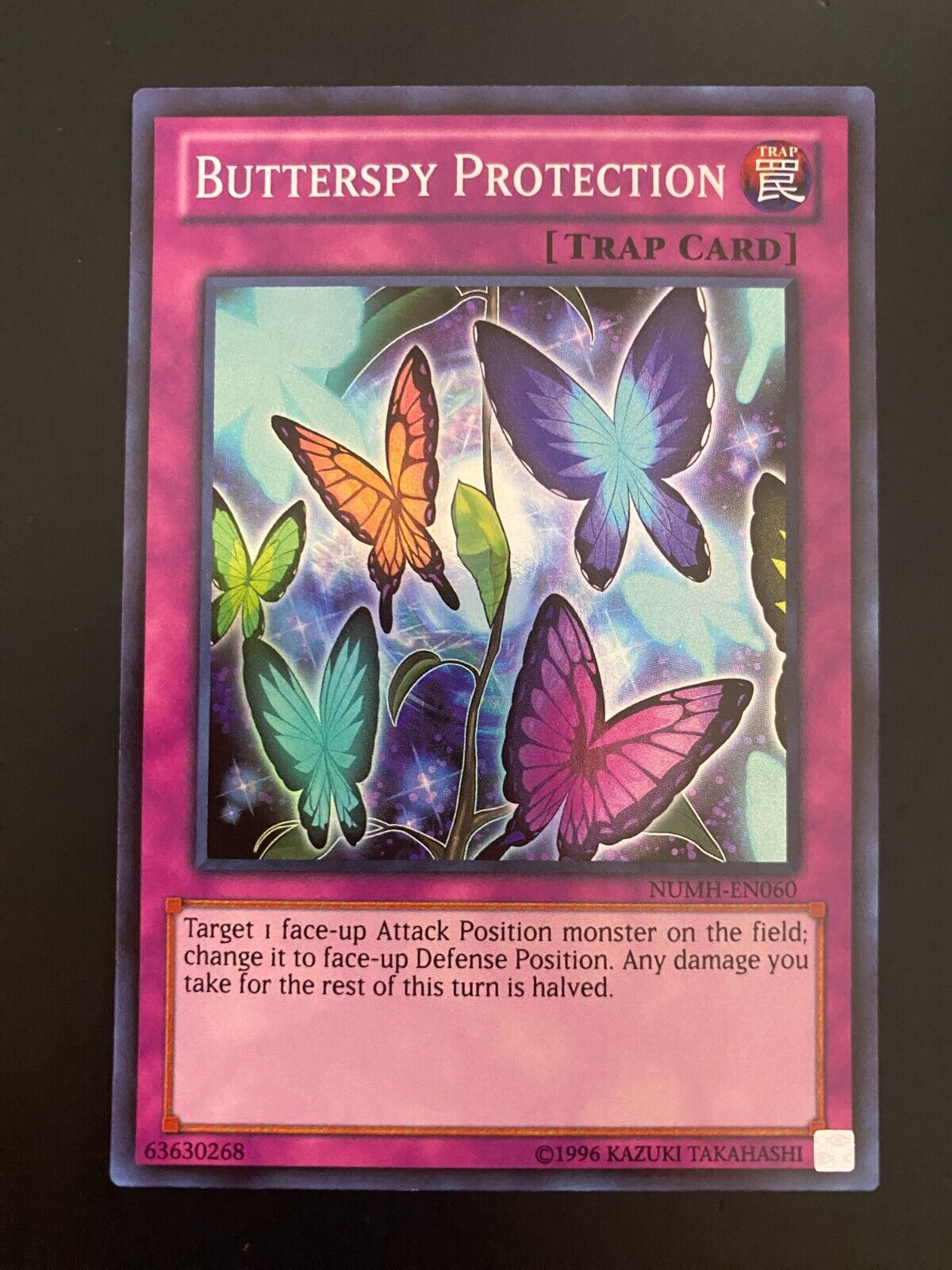 Yugioh Butterspy Protection NUMH-EN060 Super Rare Unlimited Edition NM