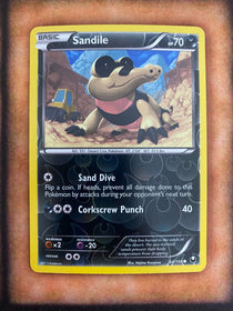 Pokemon Sandile 64/108 Dark Explorers Reverse Holo NM/MINT