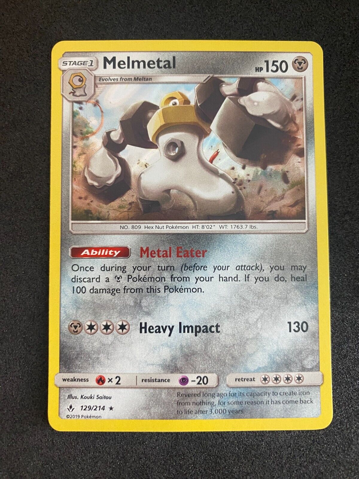 Pokemon Melmetal 129/214 Unbroken Bonds Holo NM