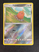 Pokemon Alolan Diglett 121/214 Unbroken Bonds Reverse Holo NM