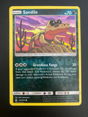 Pokemon Sandile 114/214 Unbroken Bonds Reverse Holo OFFCENTERED NM