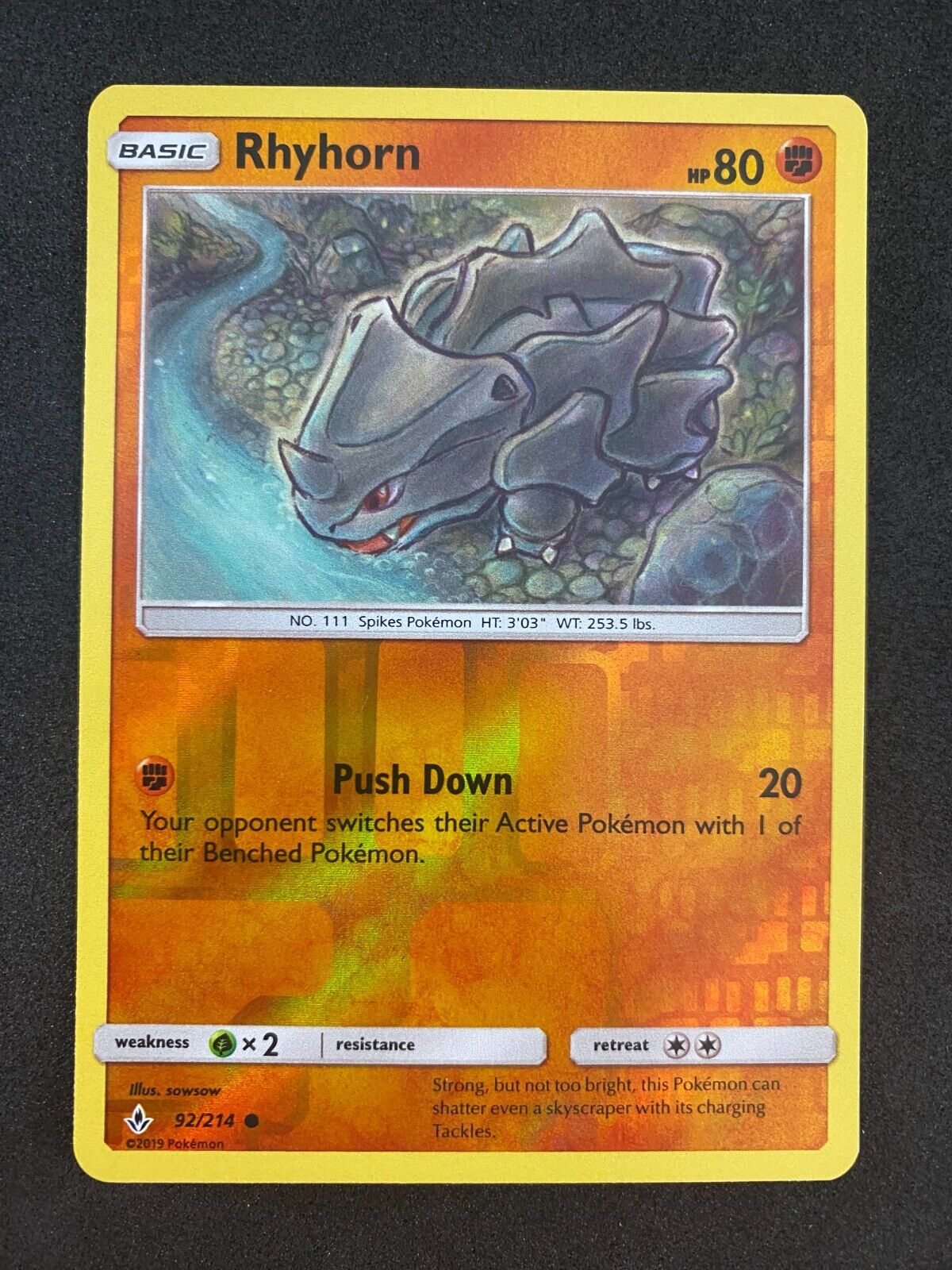 Pokemon Rhyhorn 92/214 Unbroken Bonds Reverse Holo NM