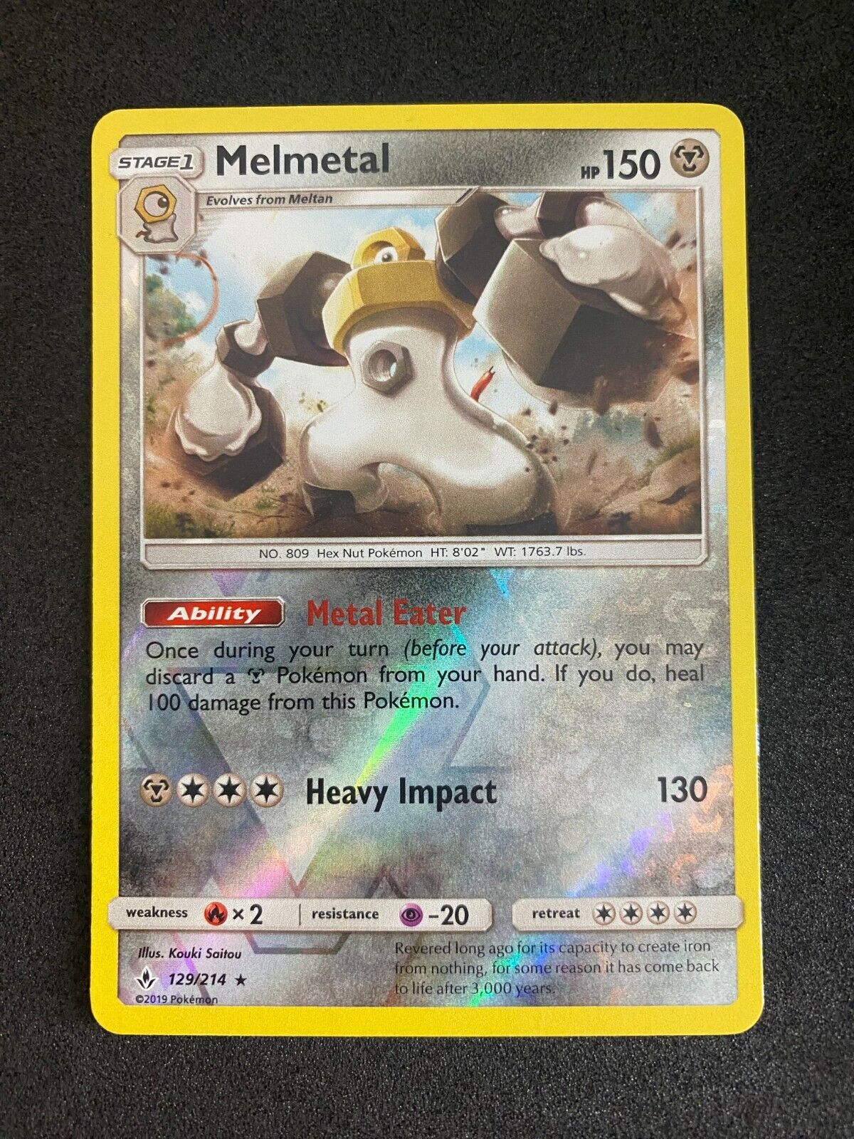 Pokemon Melmetal 129/214 Unbroken Bonds Reverse Holo NM