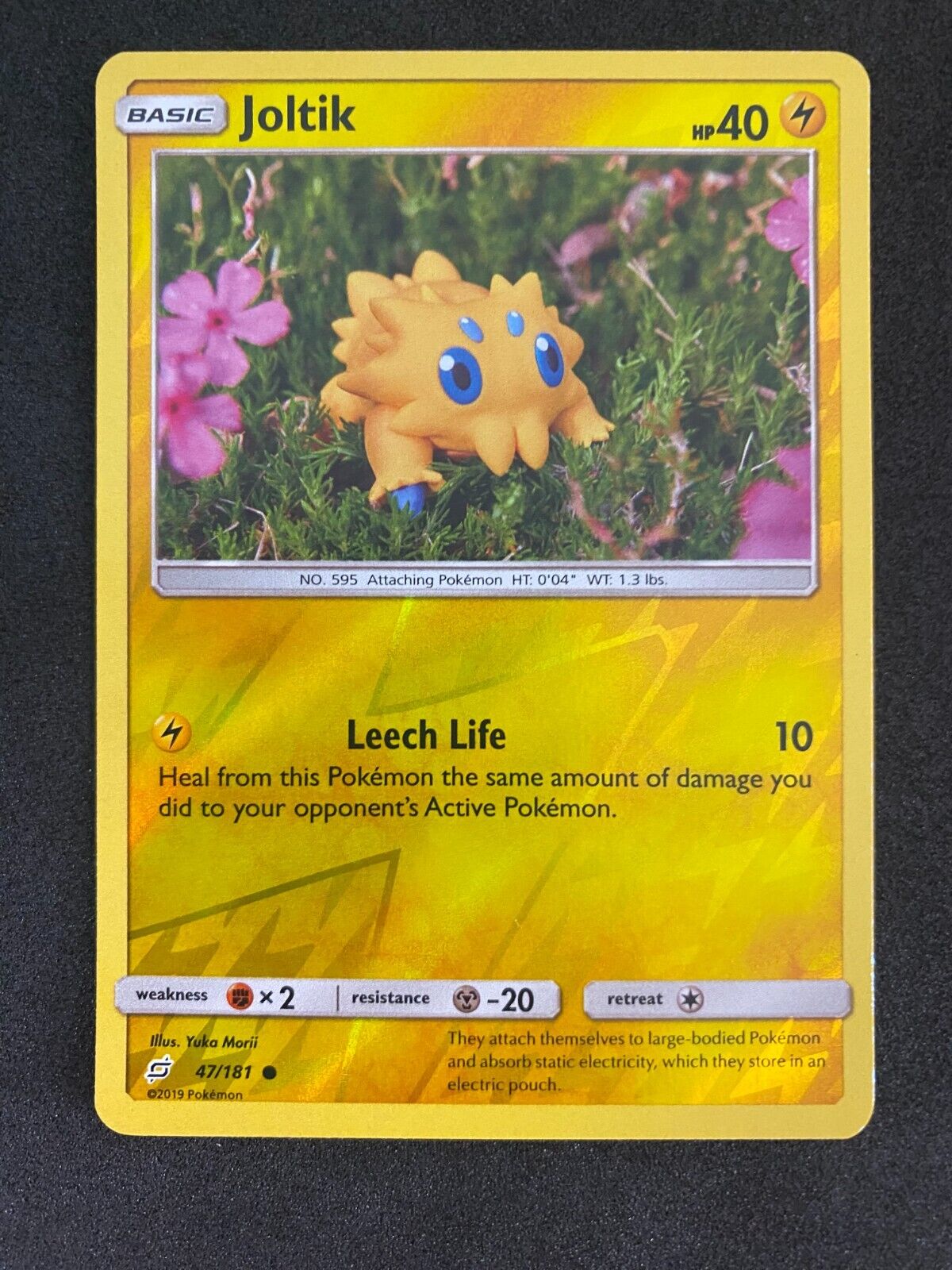 Pokemon Joltik 47/181 Team Up Reverse Holo NM