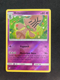 Pokemon Beheeyem 91/236 Unified Minds Reverse Holo NM