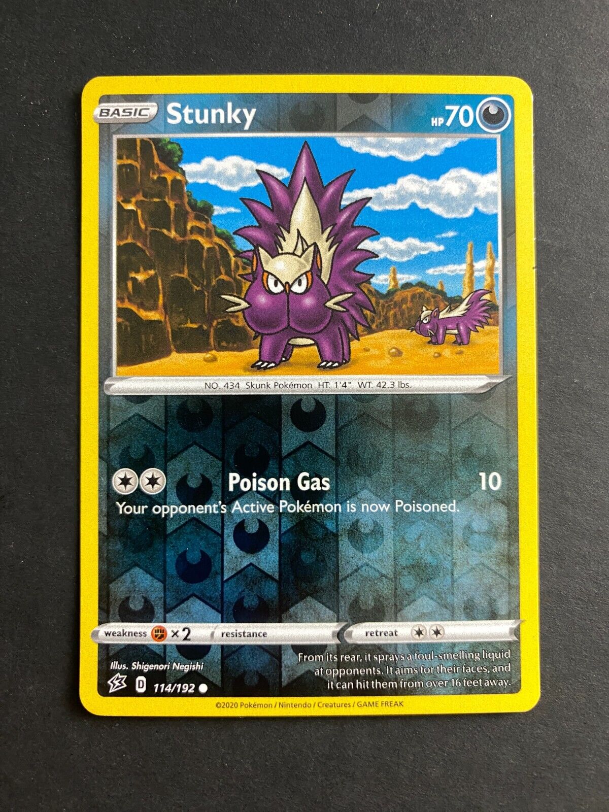 Pokemon Stunky 114/192 Rebel Clash Reverse Holo NM