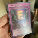 Yugioh Booby Trap E WIRA-EN013 Super Rare 1st Edition MP