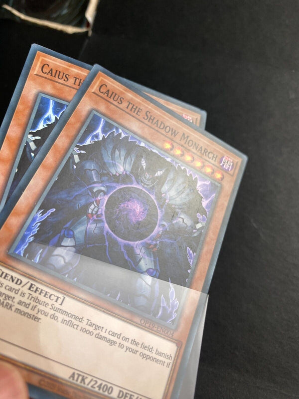 Yugioh Caius the Shadow Monarch OP19-EN004 Super Rare Unlimited Edition MP/LP