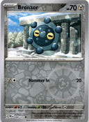 Pokemon Bronzor 066/131 Prismatic Evolutions Reverse Holo NM