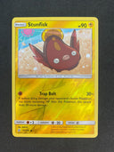 Pokemon Stunfisk 67/236 Unified Minds Reverse Holo NM