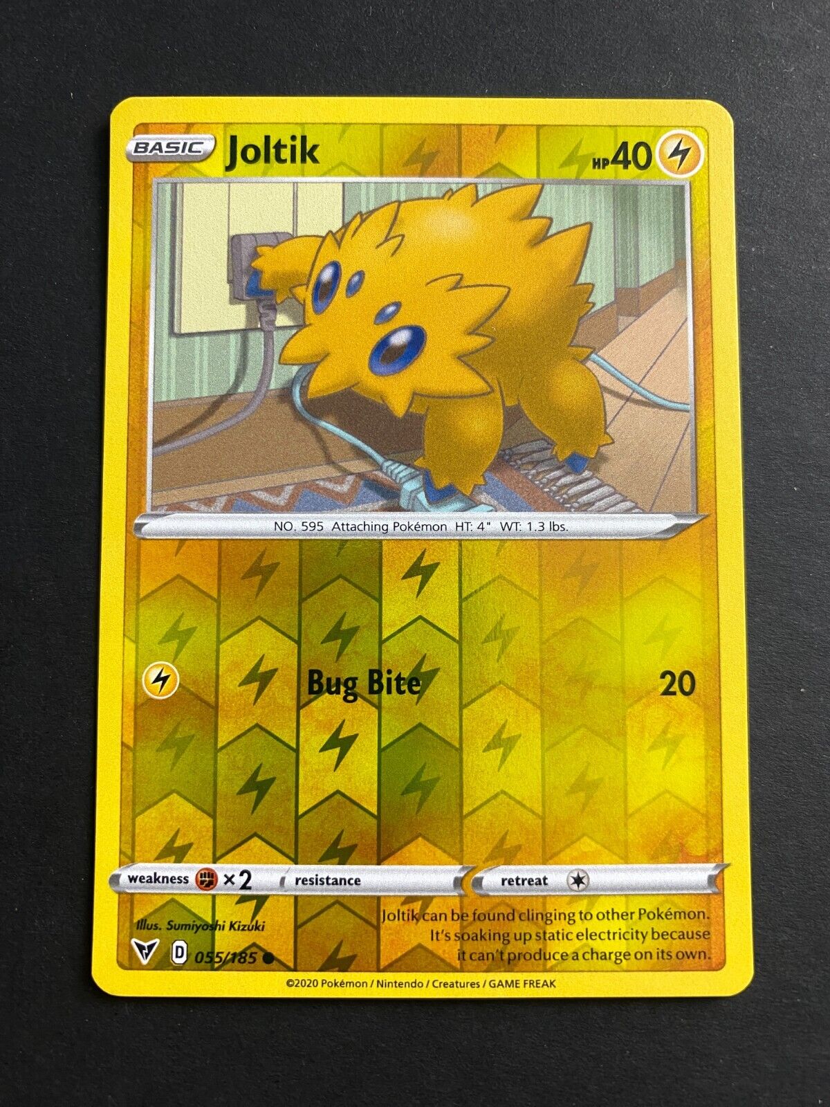 Pokemon Joltik 055/185 Vivid Voltage Reverse Holo NM