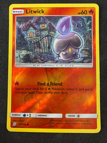 Pokemon Litwick 28/236 Unified Minds Reverse Holo NM