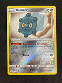 Pokemon Bronzor 100/181 Team Up Reverse Holo NM