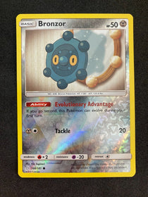 Pokemon Bronzor 100/181 Team Up Reverse Holo NM